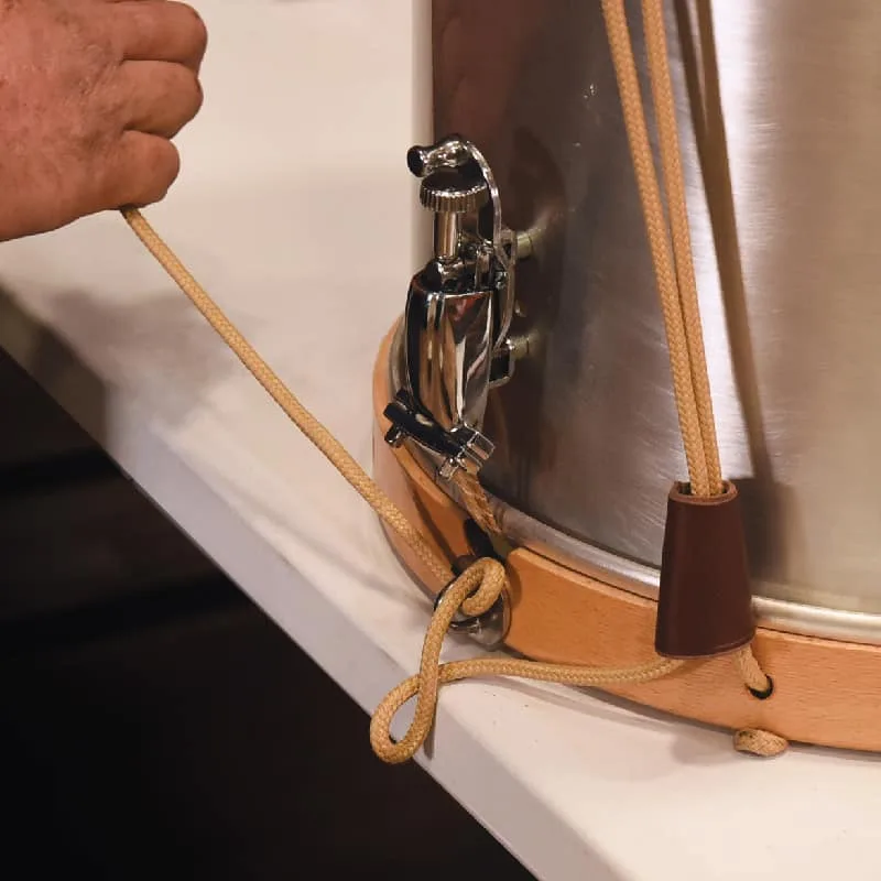 Changement de cordage - Tambour à corde